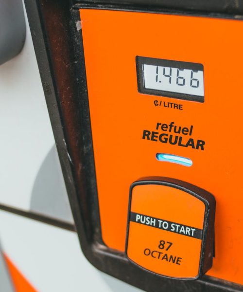 Detailed view of a gas pump showing price and octane level 87.
